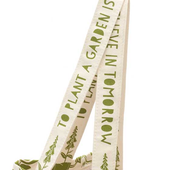 'To plant a garden' quote tote bag product photo back L