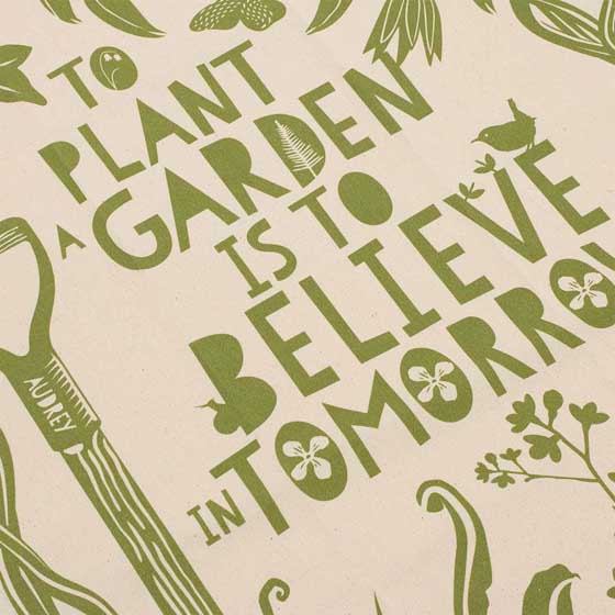 'To plant a garden' quote tea towel product photo back L