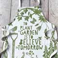 'To plant a garden' quote apron product photo side T