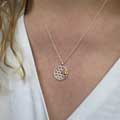Bee on honeycomb necklace by Reeves & Reeves product photo side T